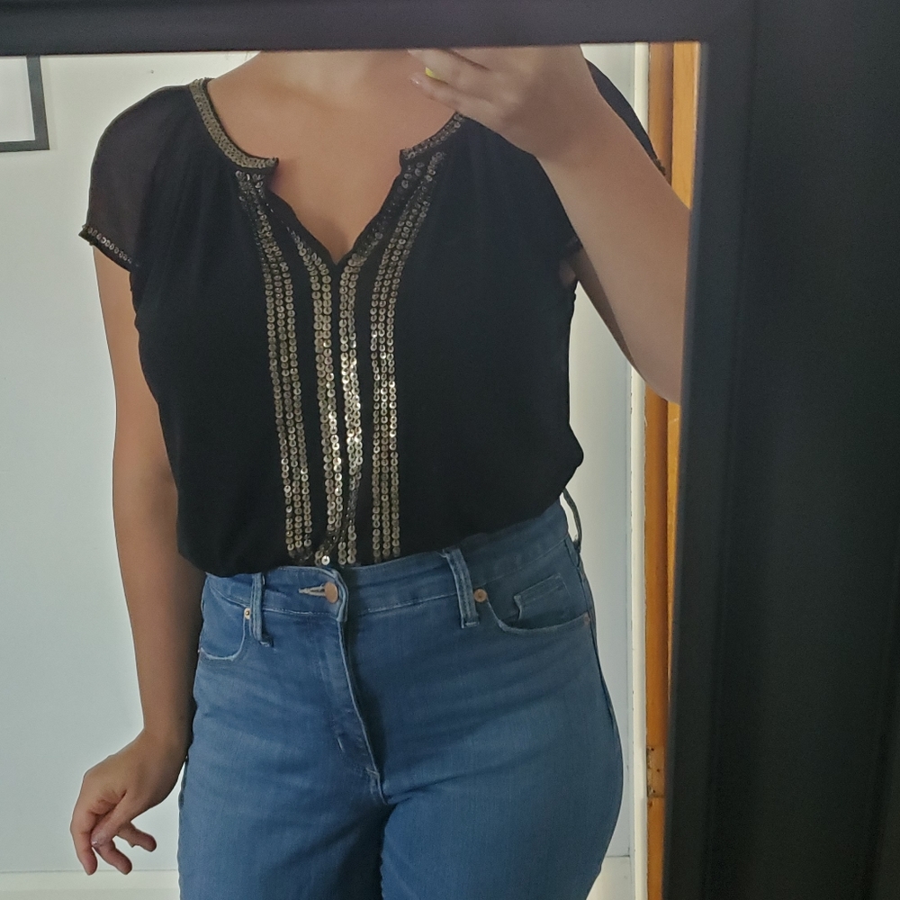 Black top with short sleeves and sequin detail